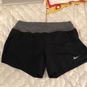 Black NIKE shorts with gray band Sz. M